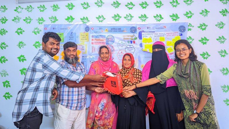 Champions of resilience: A group portrait of the project participants alongside the dedicated "Waste Club" champions, who will take the lead in sustaining these waste management initiatives within the community. | Photo: Ramisa Maliha